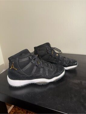 Jordan Black and Gold High-Top Sneakers